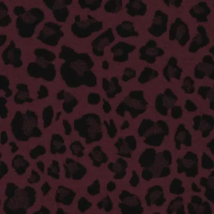 Tela Jacquard reversible animal print Rojo