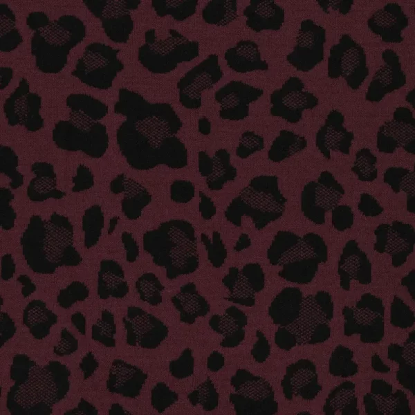 Tela Jacquard reversible animal print Rojo